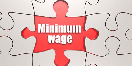 Minimum wage word on jigsaw puzzle