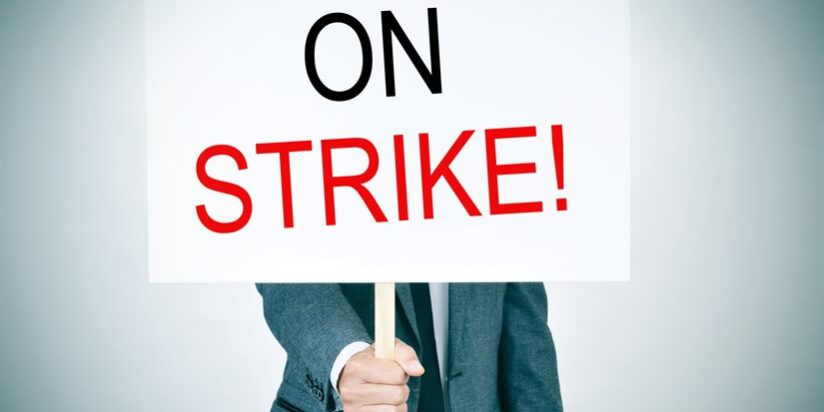 young man in suit on strike