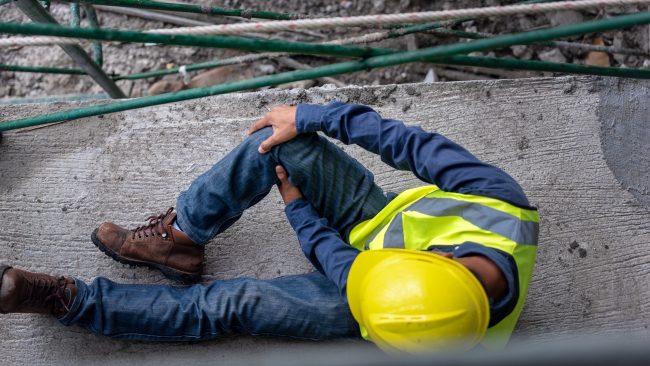 Knee,Accident,At,Work,Of,Construction,Worker,At,Site.,Builder