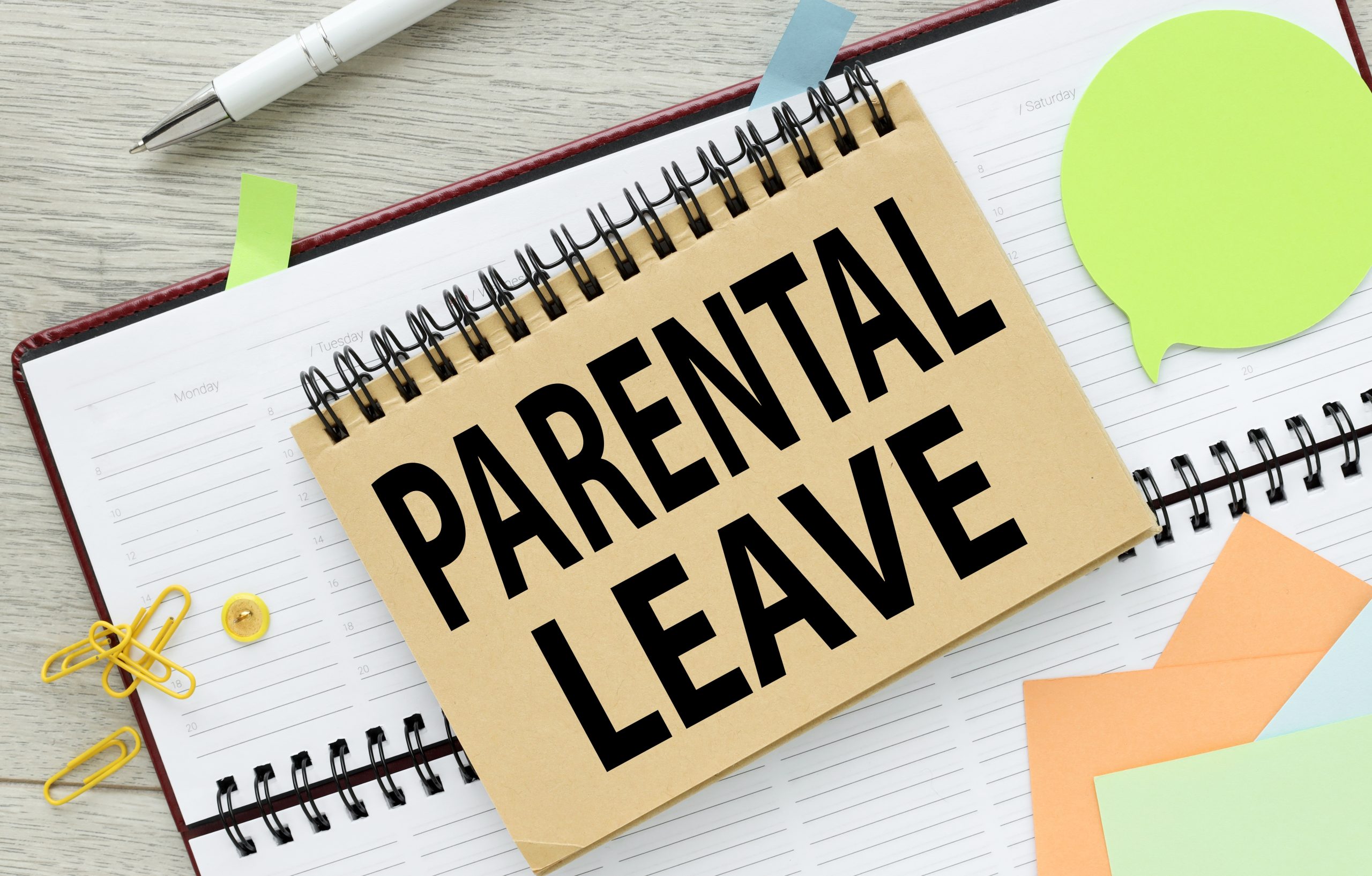 Parental,Leave,Text,On,An,Open,Notepad.,On,The,Diary.